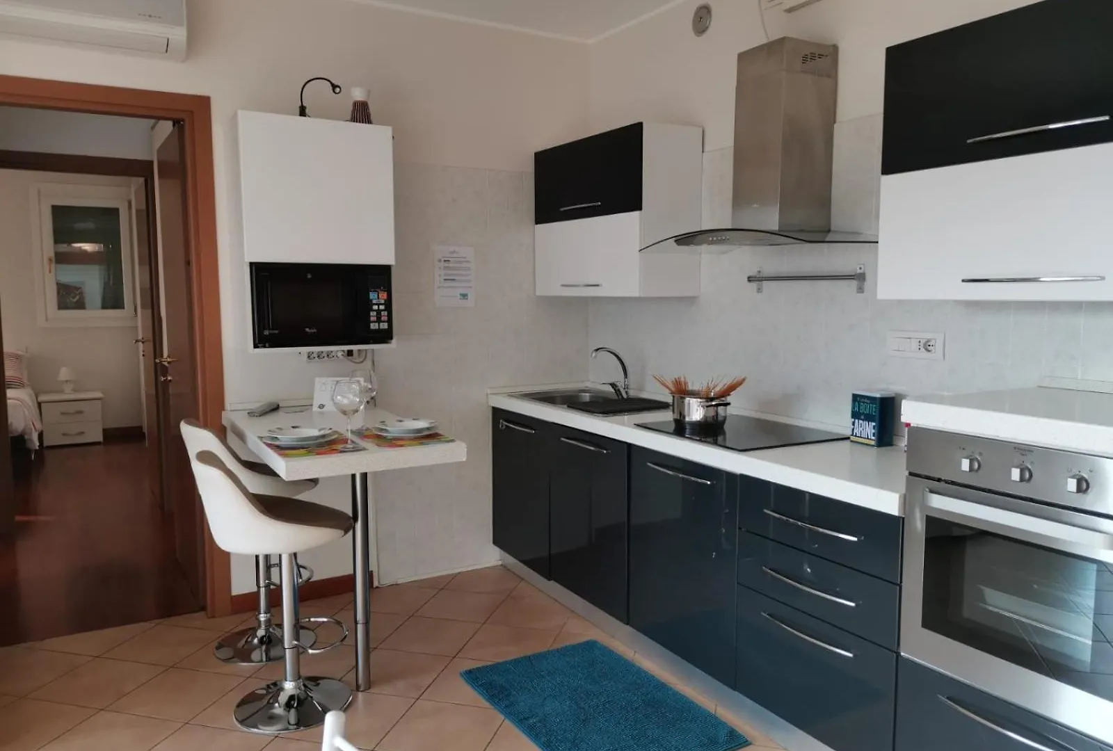 Bnbook - Metropolitan Expo Flat Rho 0*,  Italy
